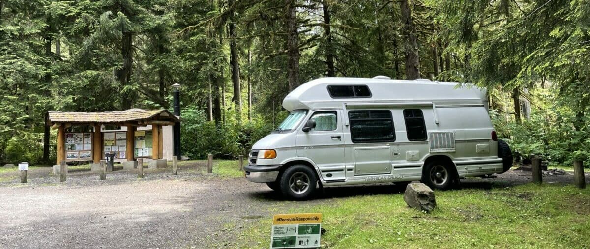 Park with your van facing out for safety while camping
